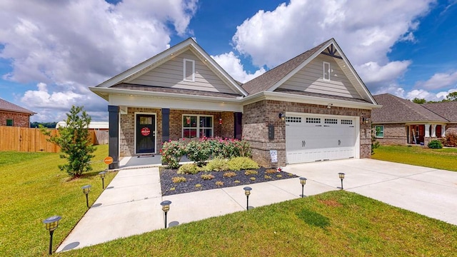 160 Sandbed Rd, Newton, AL 36352 - craftsman-style home with driveway, brick siding, covered porch, and a garage
