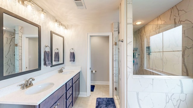 160 Sandbed Rd, Newton, AL 36352 - full bath with a marble finish shower, double vanity, and tile patterned flooring