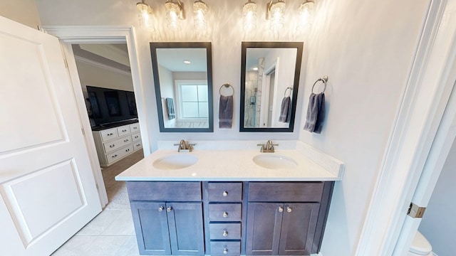 160 Sandbed Rd, Newton, AL 36352 - bathroom with double vanity, crown molding, and tile patterned flooring