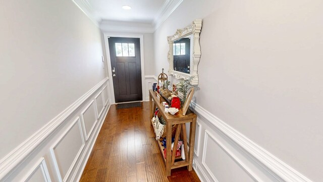 160 Sandbed Rd, Newton, AL 36352 - doorway to outside with a decorative wall, wainscoting, crown molding, and dark wood-style flooring