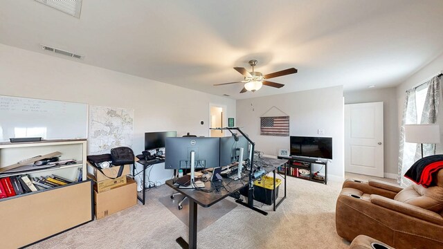 160 Sandbed Rd, Newton, AL 36352 - carpeted living area featuring a ceiling fan and a desk