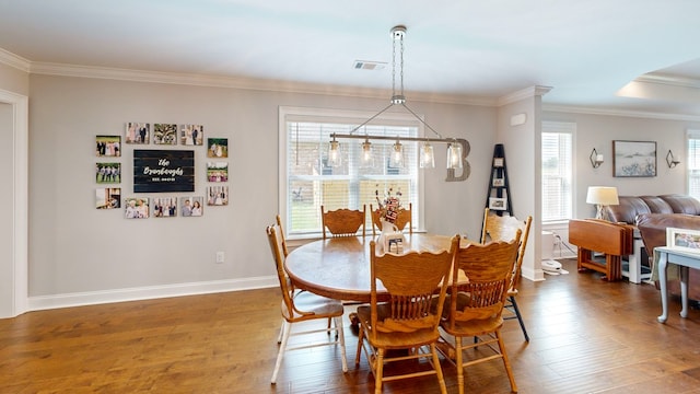 160 Sandbed Rd, Newton, AL 36352 - dining room featuring wood finished floors and crown molding