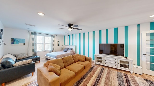 bedroom featuring wood-type flooring and ceiling fan