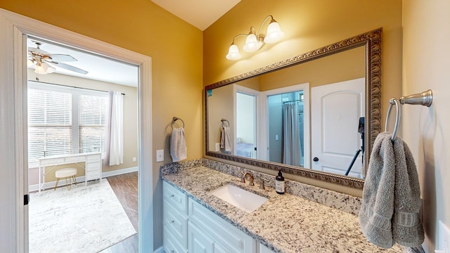 bathroom with vanity and ceiling fan