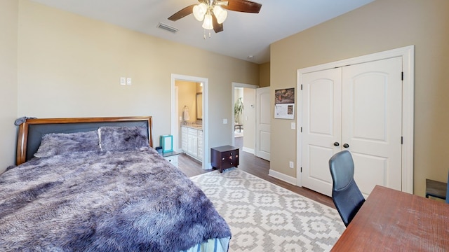 bedroom featuring hardwood / wood-style floors, a closet, and ceiling fan