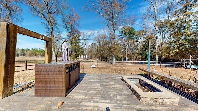 view of patio / terrace featuring an outdoor fire pit