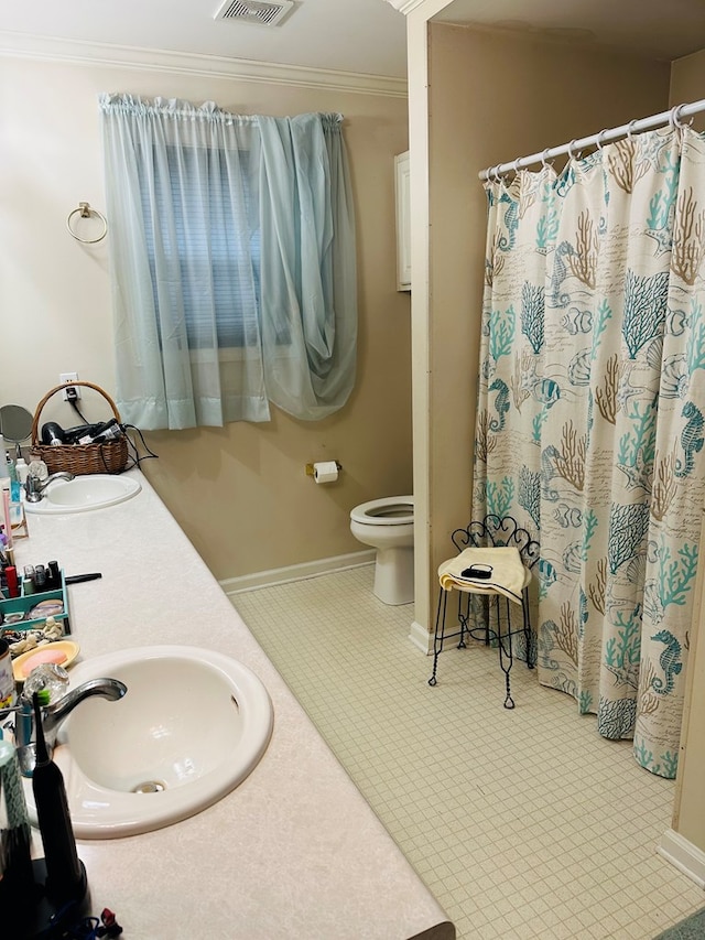 full bath featuring visible vents, toilet, crown molding, and a sink