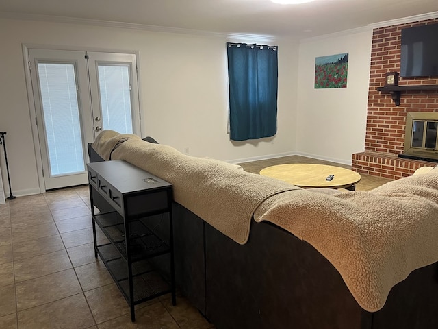16 Holman St, Daleville, AL 36322 - tiled living area featuring crown molding and a brick fireplace