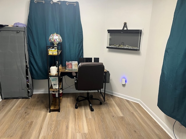 16 Holman St, Daleville, AL 36322 - home office featuring wood finished floors and baseboards