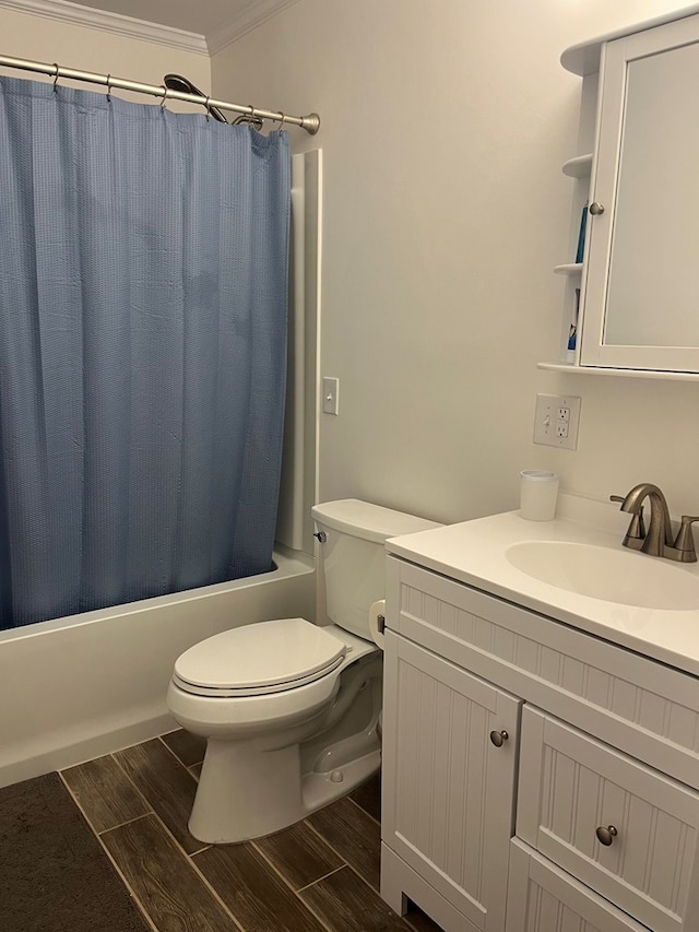 16 Holman St, Daleville, AL 36322 - full bath featuring ornamental molding, shower / bathtub combination with curtain, vanity, and wood finished floors