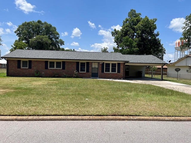 16 Holman St, Daleville, AL 36322 - ranch-style home with a carport, driveway, and brick siding