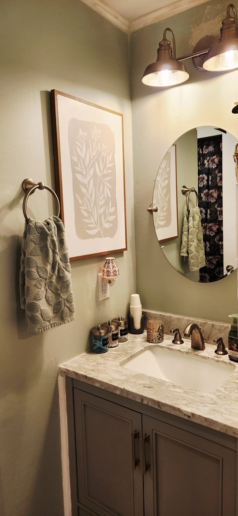 207 W Pullum St, Samson, AL 36477 - bathroom featuring vanity and crown molding