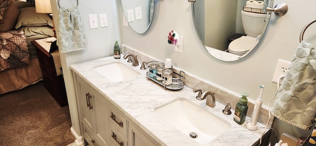 207 W Pullum St, Samson, AL 36477 - bathroom with double vanity and toilet