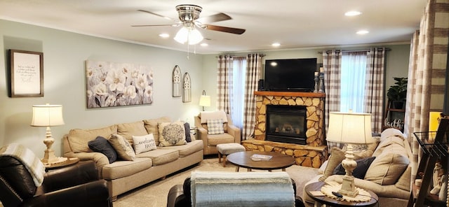 207 W Pullum St, Samson, AL 36477 - living area with a ceiling fan, a stone fireplace, crown molding, and recessed lighting