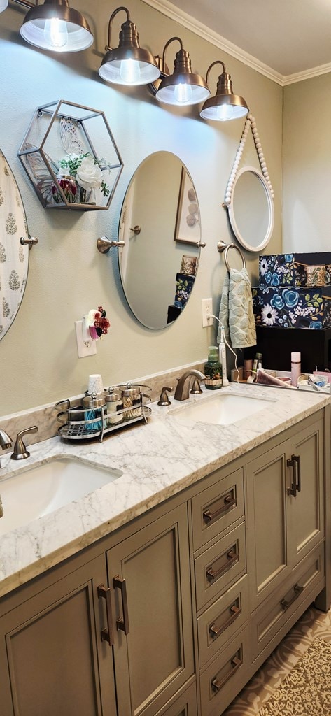 207 W Pullum St, Samson, AL 36477 - full bathroom with double vanity and ornamental molding
