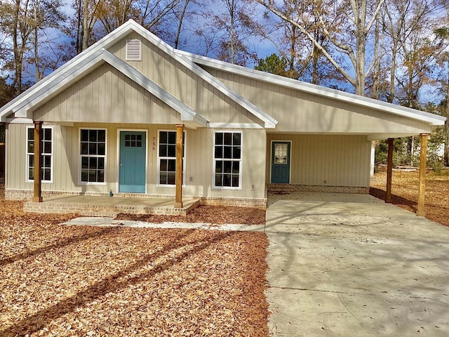 view of front of home featuring a carport