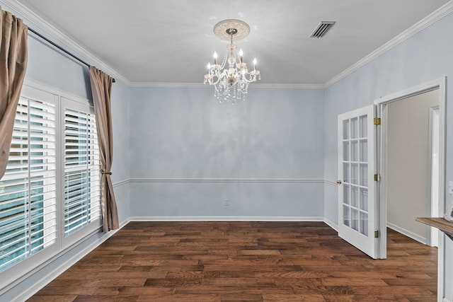108 Mulberry Ct, Dothan, AL 36303 - unfurnished dining area with a chandelier, wood finished floors, crown molding, and french doors