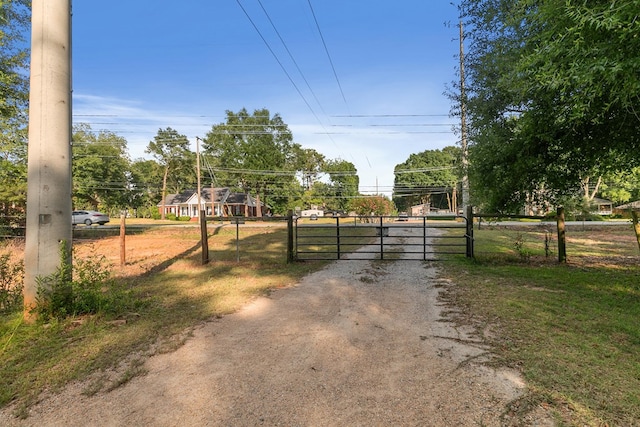 108 Mulberry Ct, Dothan, AL 36303 - view of dirt / gravel driveway with a gate and a gated entry