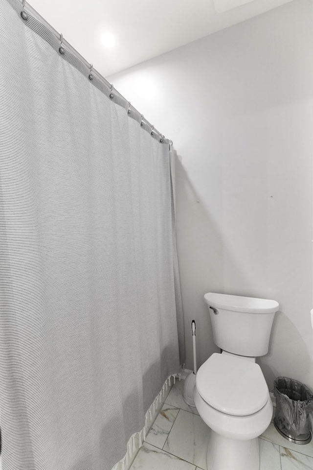 108 Mulberry Ct, Dothan, AL 36303 - bathroom with marble look tile flooring and toilet