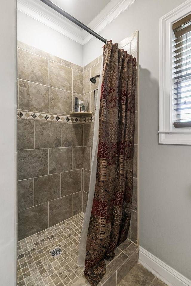 108 Mulberry Ct, Dothan, AL 36303 - bathroom featuring ornamental molding, a tile shower, and tile patterned flooring