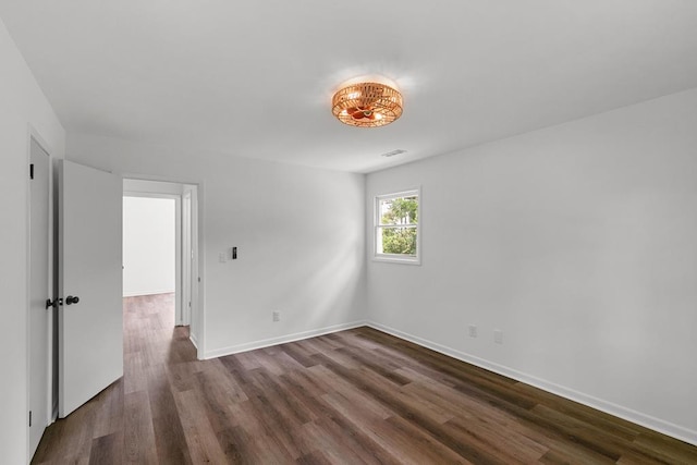 685 Hodgesville Rd, Dothan, AL 36301 - unfurnished room with dark wood-type flooring, baseboards, and visible vents