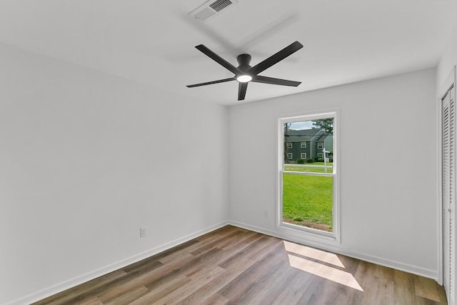 685 Hodgesville Rd, Dothan, AL 36301 - empty room featuring visible vents, a ceiling fan, baseboards, and wood finished floors