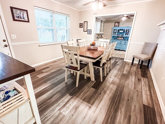 178 W Lawrence Harris Hwy, Slocomb, AL 36375 - dining area with a ceiling fan, dark wood finished floors, and crown molding