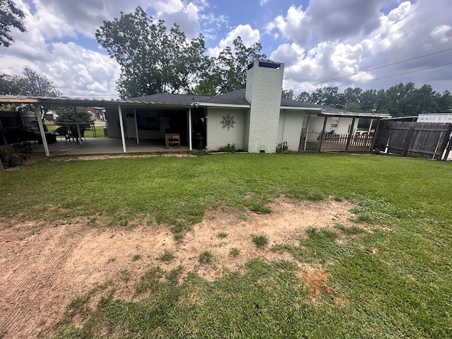 178 W Lawrence Harris Hwy, Slocomb, AL 36375 - back of property featuring a chimney and a patio area