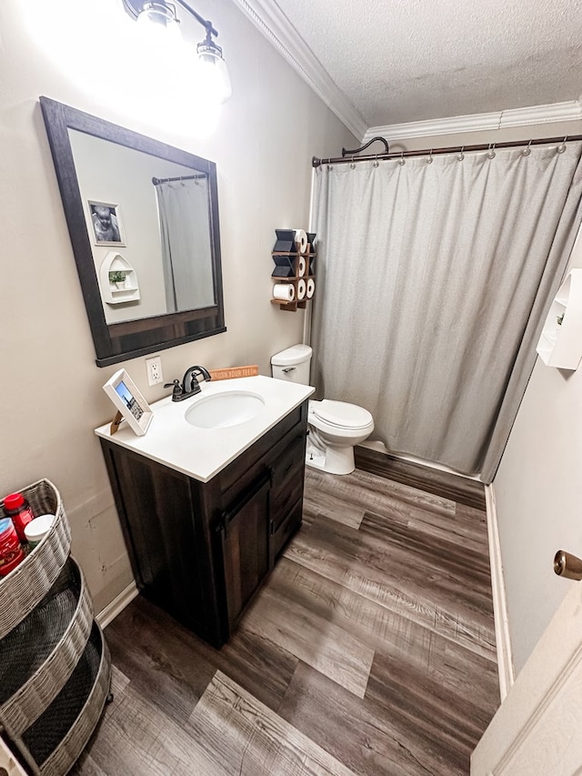 178 W Lawrence Harris Hwy, Slocomb, AL 36375 - full bath featuring vanity, wood finished floors, a textured ceiling, ornamental molding, and curtained shower