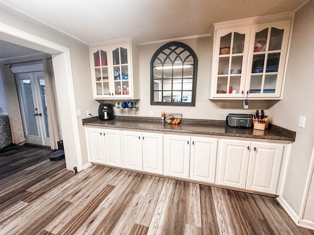 178 W Lawrence Harris Hwy, Slocomb, AL 36375 - indoor dry bar featuring wood finished floors and ornamental molding