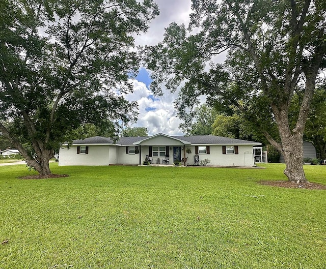 178 W Lawrence Harris Hwy, Slocomb, AL 36375 - rear view of property featuring a yard and covered porch