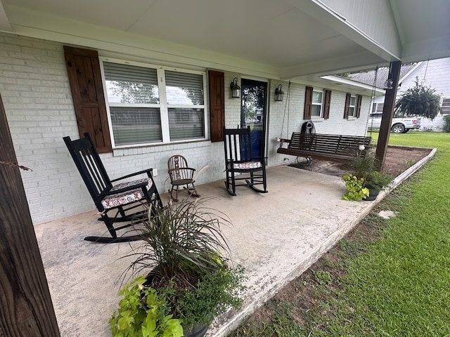 178 W Lawrence Harris Hwy, Slocomb, AL 36375 - covered porch featuring a yard