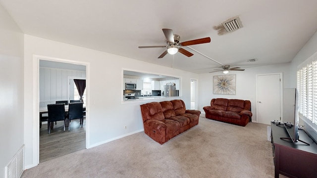 living room with light carpet