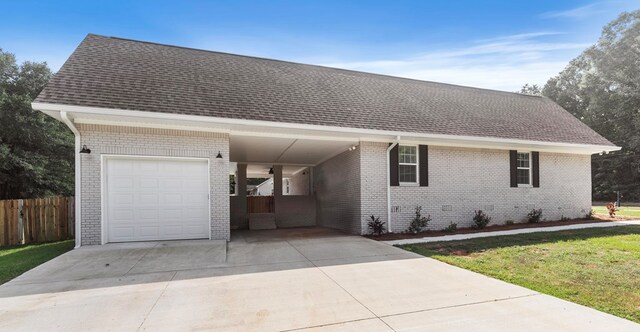 single story home with a carport and a front yard