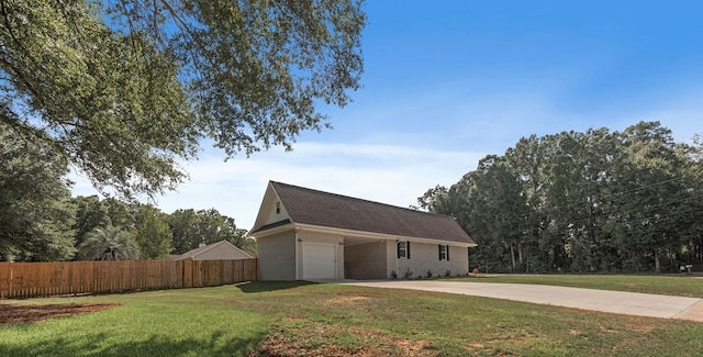 view of side of property featuring a yard