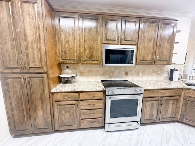 kitchen featuring decorative backsplash, light stone countertops, marble finish floor, and stainless steel range with electric cooktop