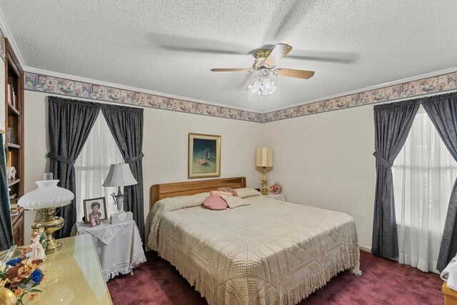 1764 John D Odom Rd, Dothan, AL 36303 - carpeted bedroom featuring a textured ceiling, ceiling fan, and ornamental molding
