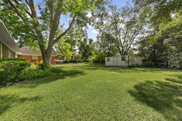 1764 John D Odom Rd, Dothan, AL 36303 - view of grassy yard with a storage shed