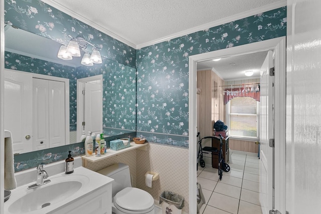 1764 John D Odom Rd, Dothan, AL 36303 - bathroom with a textured ceiling, wallpapered walls, tile patterned flooring, and vanity