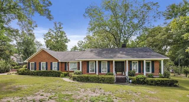 1764 John D Odom Rd, Dothan, AL 36303 - ranch-style home with brick siding, a front yard, a chimney, and a porch