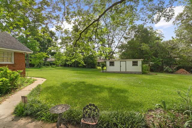 1764 John D Odom Rd, Dothan, AL 36303 - view of green lawn with a storage shed