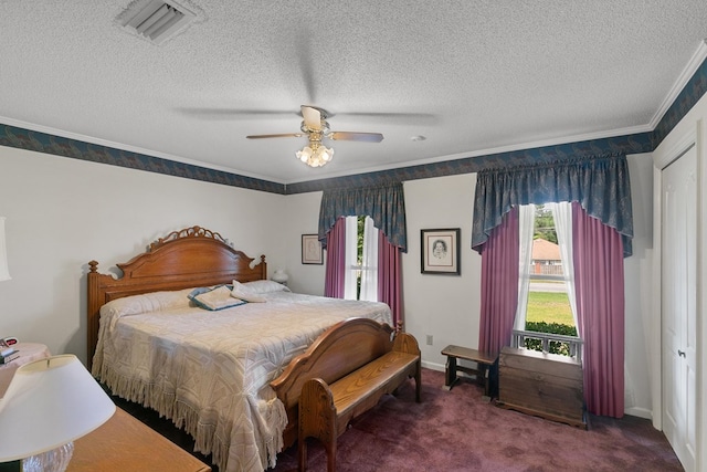 1764 John D Odom Rd, Dothan, AL 36303 - carpeted bedroom featuring a textured ceiling, ornamental molding, and ceiling fan