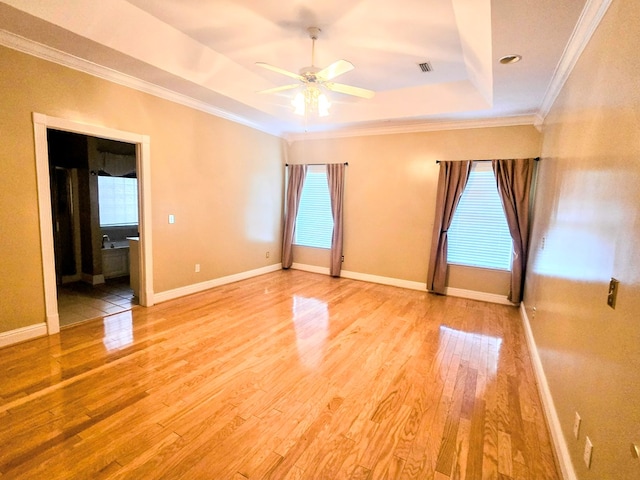 2230 W County Road 16, Headland, AL 36345 - empty room featuring crown molding, light wood-type flooring, ceiling fan, and visible vents