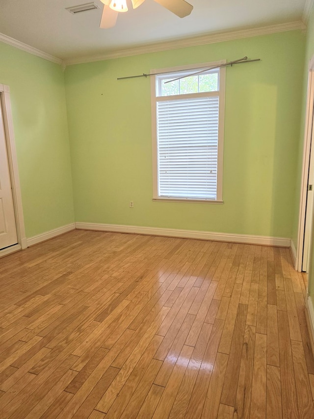 2230 W County Road 16, Headland, AL 36345 - unfurnished room with light wood-style floors, ceiling fan, crown molding, and baseboards