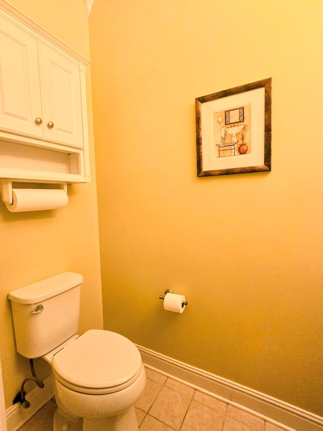 2230 W County Road 16, Headland, AL 36345 - bathroom featuring baseboards, toilet, and tile patterned flooring