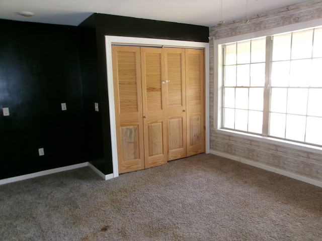 5559 N County Road 69, Newton, AL 36352 - unfurnished bedroom with carpet and a closet