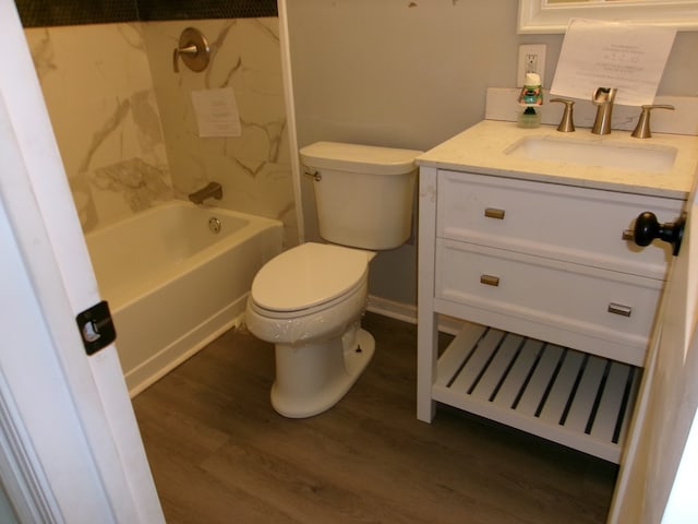 5559 N County Road 69, Newton, AL 36352 - bathroom featuring vanity, wood finished floors, and bathing tub / shower combination
