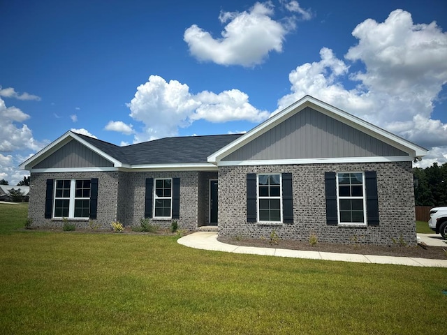 view of front of home with a front lawn