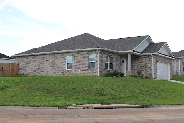114 Meer Busch Ln, Enterprise, AL 36330 - view of front facade with a garage, brick siding, and a shingled roof