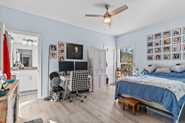 213 Archer Trl, Enterprise, AL 36351 - bedroom featuring light wood-style floors, ensuite bathroom, ceiling fan, and access to exterior